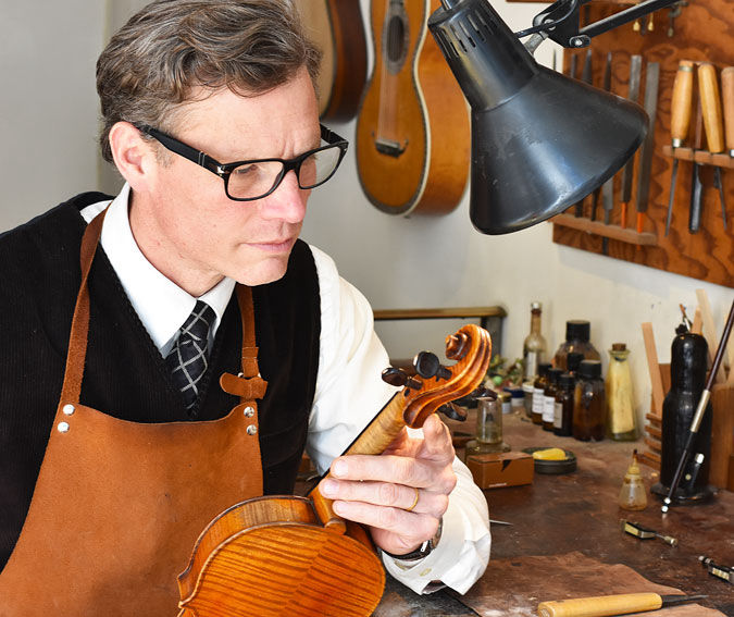 Violin specialist Ian McCamy